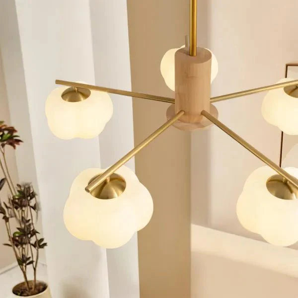 Creative chandelier in the living room made of wood and cotton balls 